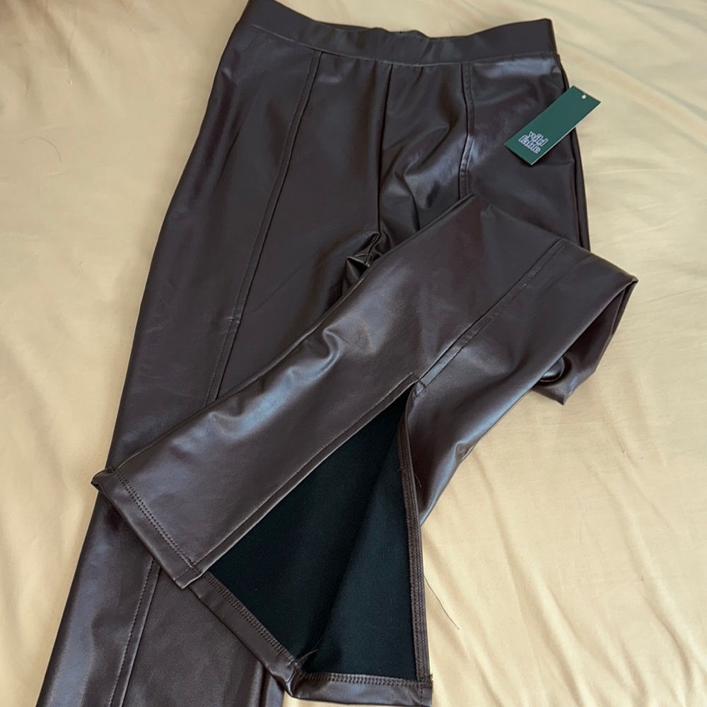 Women’s slit front faux leather flare pants